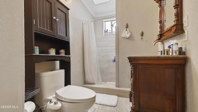 2123 Magoffin Ave, El Paso, TX 79901 - full bathroom featuring crown molding, a stall shower, vanity, and a textured wall