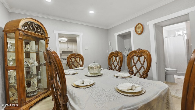 2123 Magoffin Ave, El Paso, TX 79901 - dining area with crown molding and recessed lighting