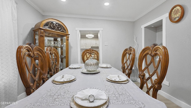 2123 Magoffin Ave, El Paso, TX 79901 - dining area with ornamental molding and baseboards