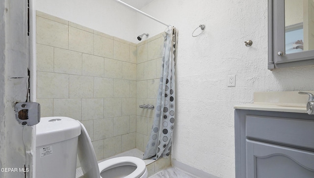 2123 Magoffin Ave, El Paso, TX 79901 - full bath featuring vanity, a shower stall, and a textured wall
