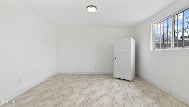 2123 Magoffin Ave, El Paso, TX 79901 - spare room featuring baseboards