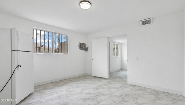 2123 Magoffin Ave, El Paso, TX 79901 - spare room with marble finish floors and baseboards