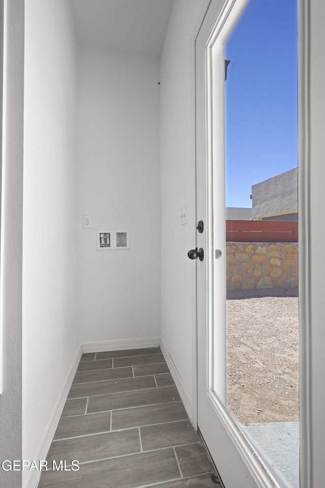 14325 Toby Davis Dr, Horizon City, TX 79928 - laundry room with wood finished floors and washer hookup
