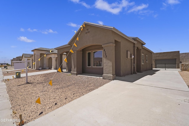 14325 Toby Davis Dr, Horizon City, TX 79928 - view of front of home with stucco siding