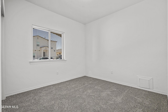 14325 Toby Davis Dr, Horizon City, TX 79928 - unfurnished room featuring carpet floors and baseboards