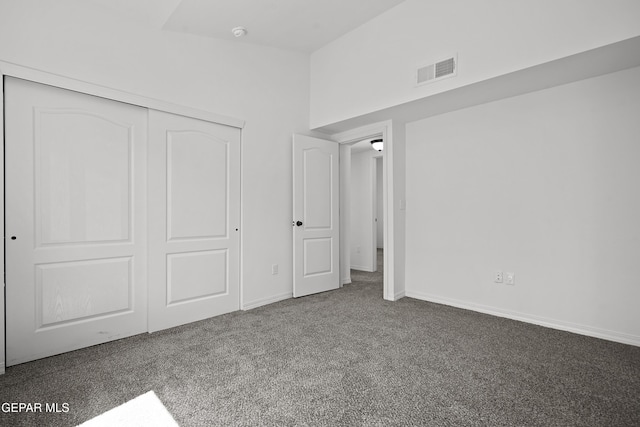 14325 Toby Davis Dr, Horizon City, TX 79928 - unfurnished bedroom featuring carpet flooring and a closet