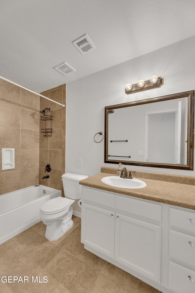 14304 Woods Point Ave, El Paso, TX 79938 - full bathroom featuring vanity, tile patterned floors, bathtub / shower combination, and a textured ceiling