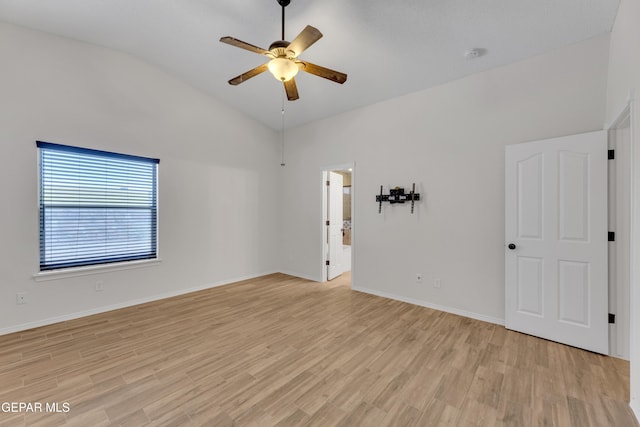 14304 Woods Point Ave, El Paso, TX 79938 - empty room with ceiling fan, lofted ceiling, and light wood-style floors