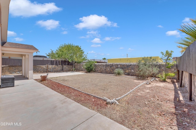 14304 Woods Point Ave, El Paso, TX 79938 - fenced backyard featuring a patio area