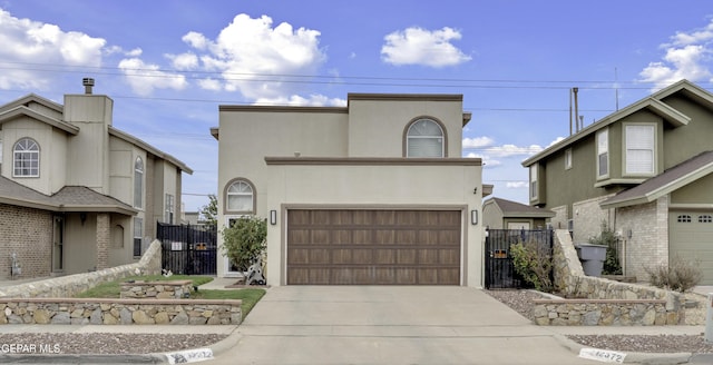 12372 Robert Dahl Dr, El Paso, TX 79938 - view of front of house with a garage, concrete driveway, and stucco siding