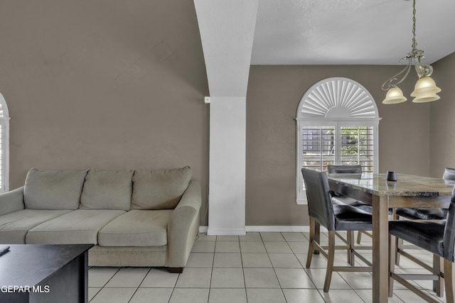12372 Robert Dahl Dr, El Paso, TX 79938 - dining space with baseboards and light tile patterned floors