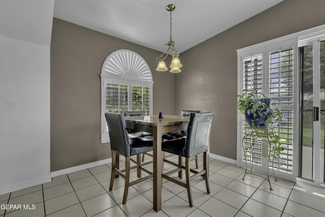12372 Robert Dahl Dr, El Paso, TX 79938 - dining area featuring a chandelier and light tile patterned floors