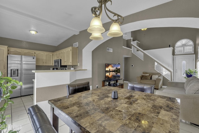 12372 Robert Dahl Dr, El Paso, TX 79938 - dining room featuring arched walkways, stairway, and light tile patterned floors