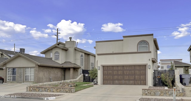 12372 Robert Dahl Dr, El Paso, TX 79938 - view of front of house with driveway, a garage, and stucco siding