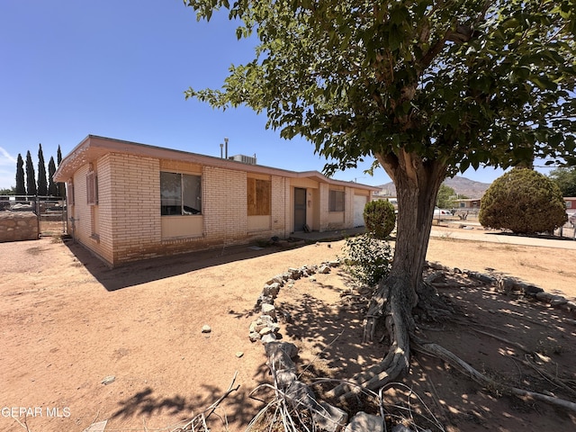 10452 Omega Cir, El Paso, TX 79924 - view of front facade with brick siding