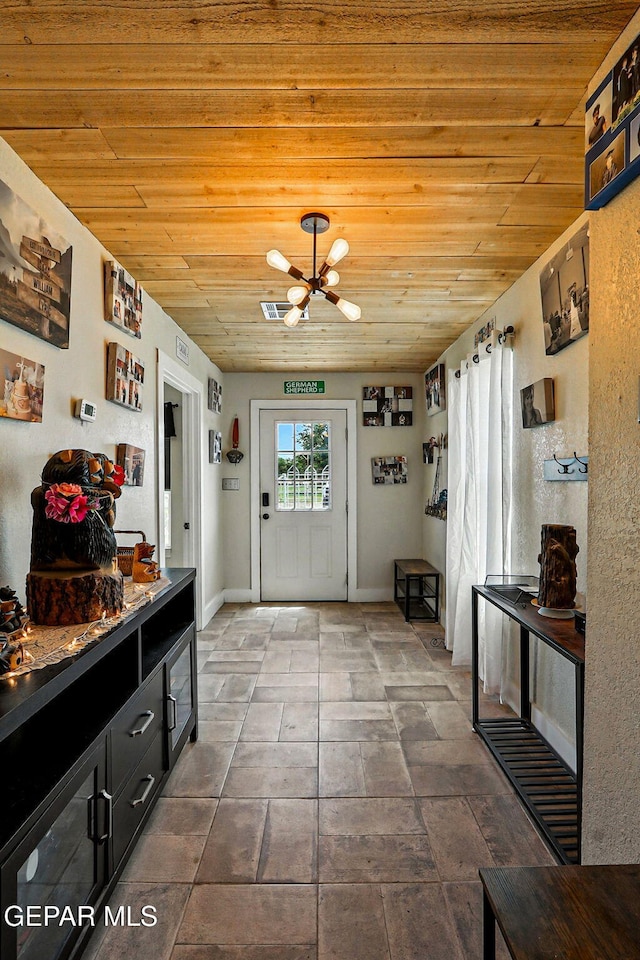 1624 Vinton Rd, Anthony, NM 88021 - entrance foyer featuring wood ceiling and stone finish floors