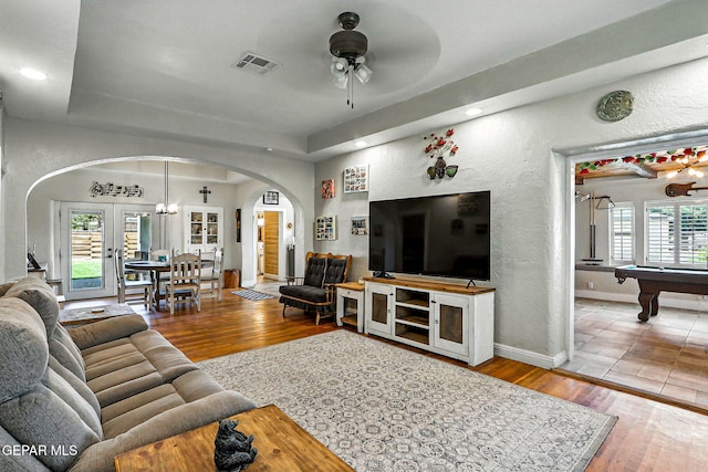 1624 Vinton Rd, Anthony, NM 88021 - living area with arched walkways, ceiling fan, hardwood / wood-style flooring, pool table, and a raised ceiling