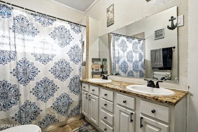 1624 Vinton Rd, Anthony, NM 88021 - bathroom with crown molding, double vanity, and curtained shower