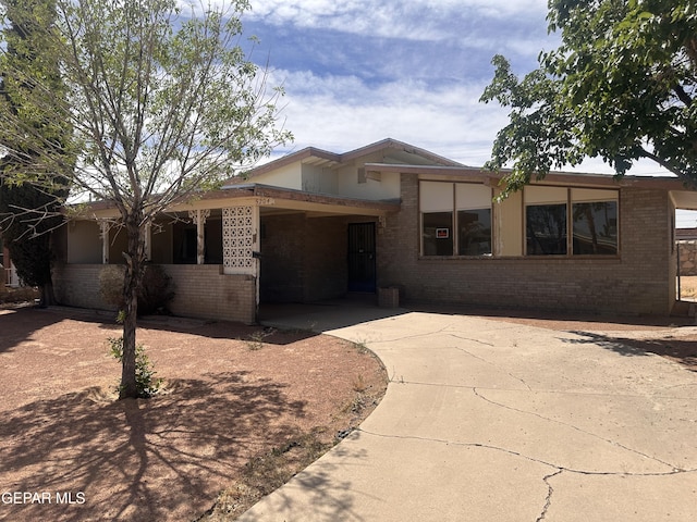 5204 Antonio Ave, El Paso, TX 79924 - view of front of property featuring brick siding and concrete driveway