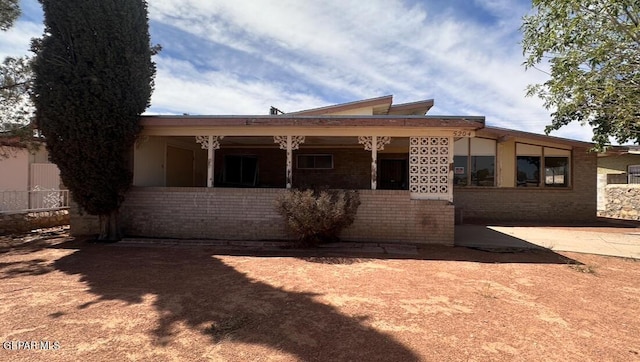 5204 Antonio Ave, El Paso, TX 79924 - rear view of house featuring brick siding