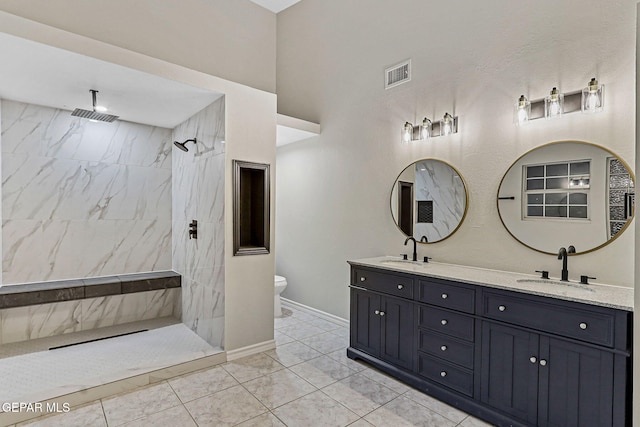 8921 Gemotes Pl, El Paso, TX 79907 - full bath featuring double vanity and a marble finish shower