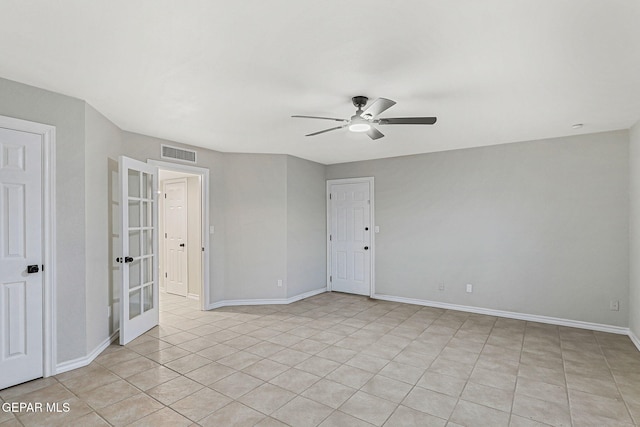 8921 Gemotes Pl, El Paso, TX 79907 - spare room with ceiling fan, french doors, and light tile patterned flooring