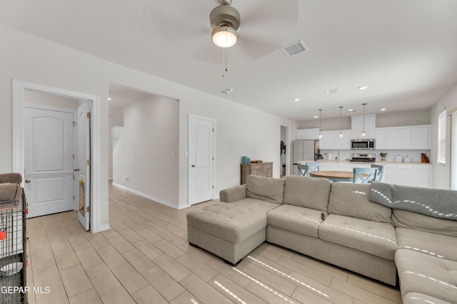 1649 Sam Dominguez, El Paso, TX 79928 - living room with ceiling fan and recessed lighting