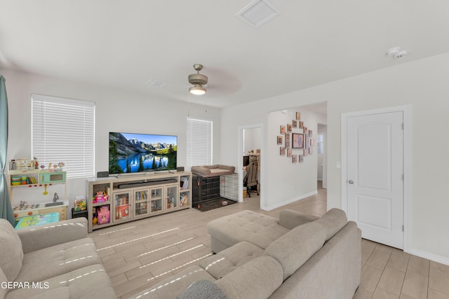 1649 Sam Dominguez, El Paso, TX 79928 - living area with a ceiling fan and wood finish floors