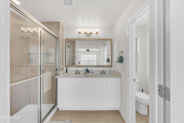 1649 Sam Dominguez, El Paso, TX 79928 - bathroom with tile patterned floors, a stall shower, double vanity, a ceiling fan, and a chandelier