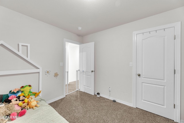 1649 Sam Dominguez, El Paso, TX 79928 - carpeted bedroom with baseboards