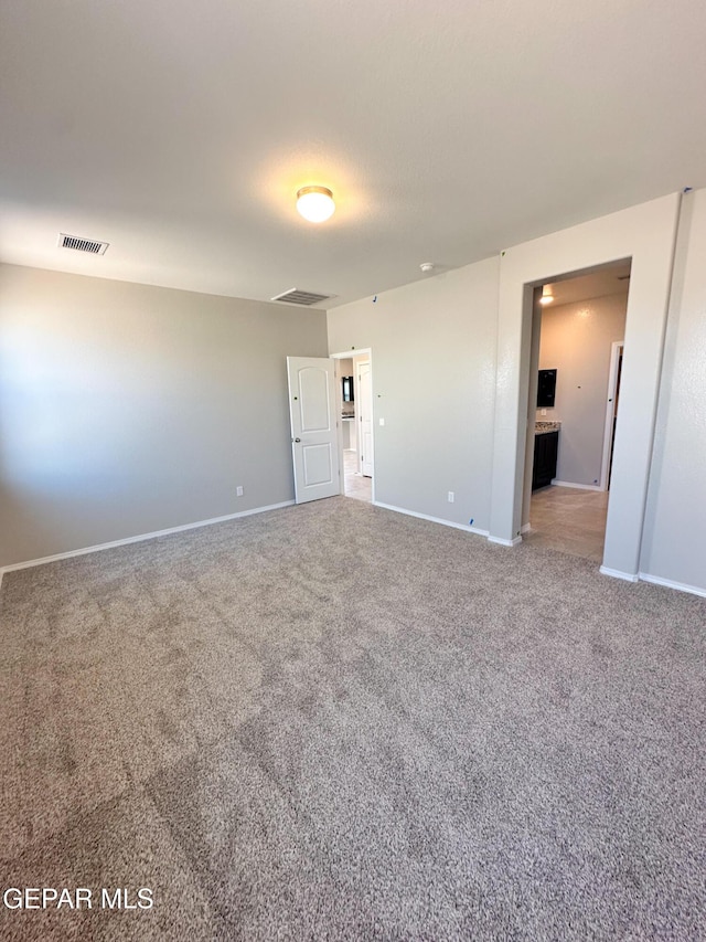 12577 Polo Norte Dr, El Paso, TX 79934 - carpeted spare room featuring baseboards