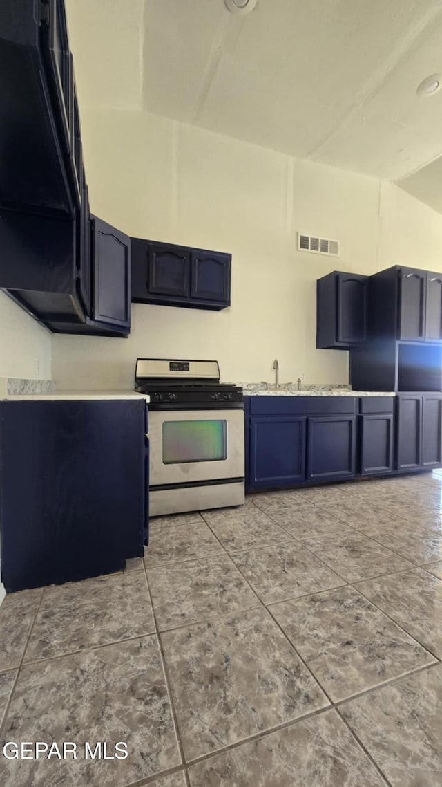 557 Bonampak Dr, San Elizario, TX 79849 - kitchen featuring stainless steel range with gas cooktop and light countertops