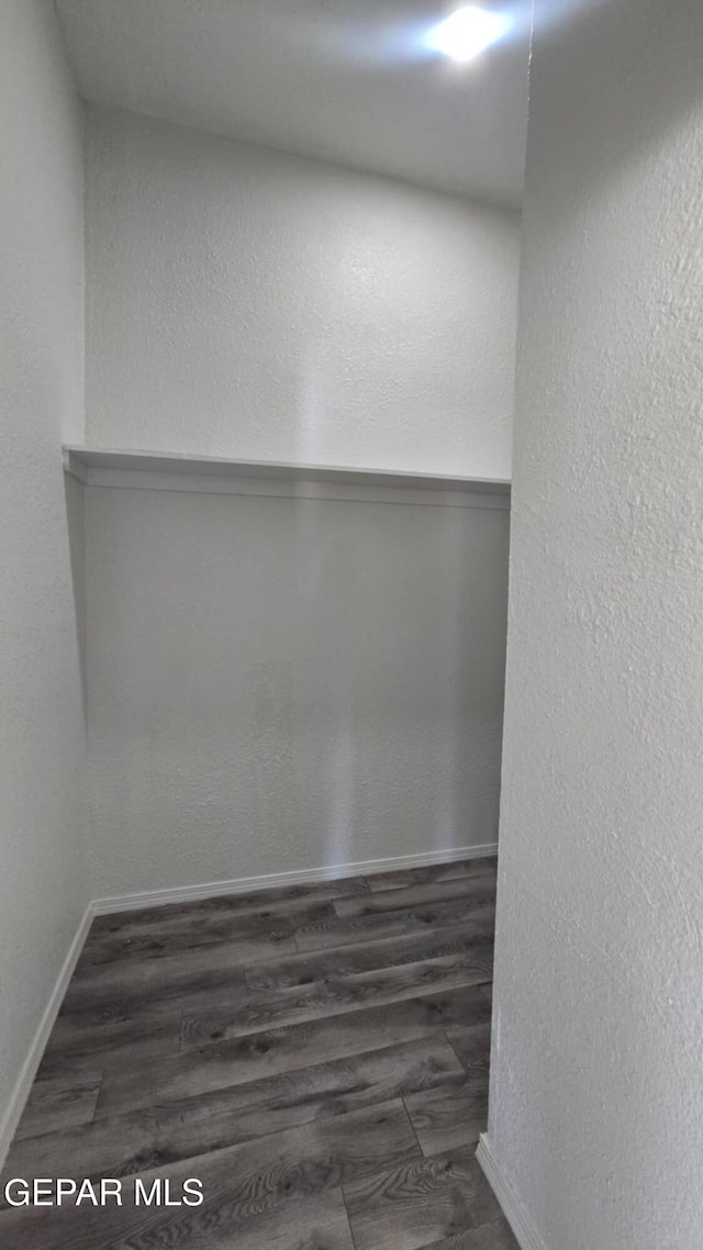 557 Bonampak Dr, San Elizario, TX 79849 - spare room with wood finished floors and baseboards