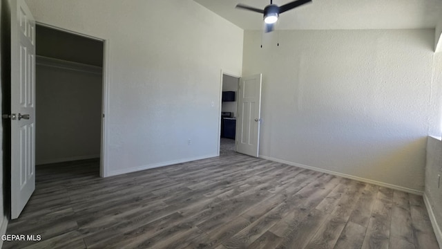 557 Bonampak Dr, San Elizario, TX 79849 - unfurnished bedroom with lofted ceiling, wood finished floors, a closet, and ceiling fan