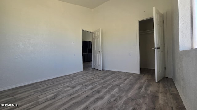557 Bonampak Dr, San Elizario, TX 79849 - unfurnished bedroom featuring wood finished floors and a closet