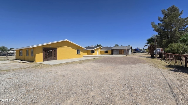 557 Bonampak Dr, San Elizario, TX 79849 - view of front of property featuring stucco siding