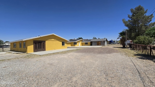 557 Bonampak Dr, San Elizario, TX 79849 - view of front of home featuring stucco siding