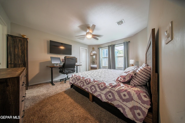 13163 Emerald Isle St, El Paso, TX 79928 - carpeted bedroom featuring an office area and ceiling fan
