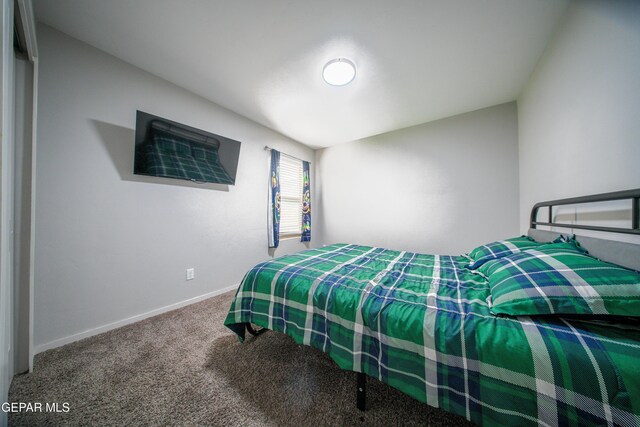 13163 Emerald Isle St, El Paso, TX 79928 - carpeted bedroom with baseboards