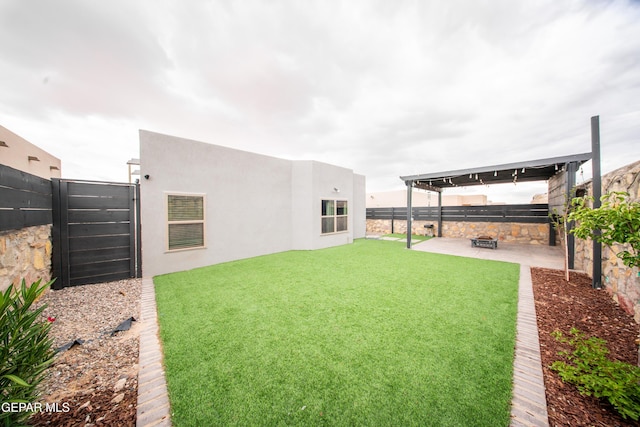 13163 Emerald Isle St, El Paso, TX 79928 - fenced backyard with a patio area
