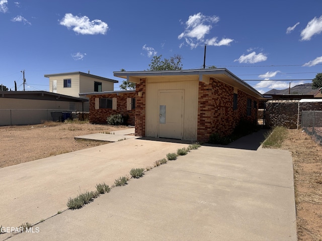 10045 Kellogg St, El Paso, TX 79924 - view of front of home featuring brick siding