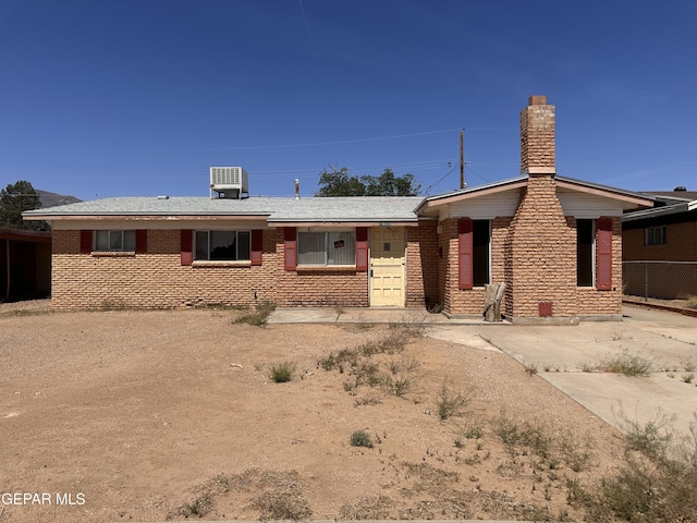 10333 Wilshire Dr, El Paso, TX 79924 - single story home with brick siding and a chimney
