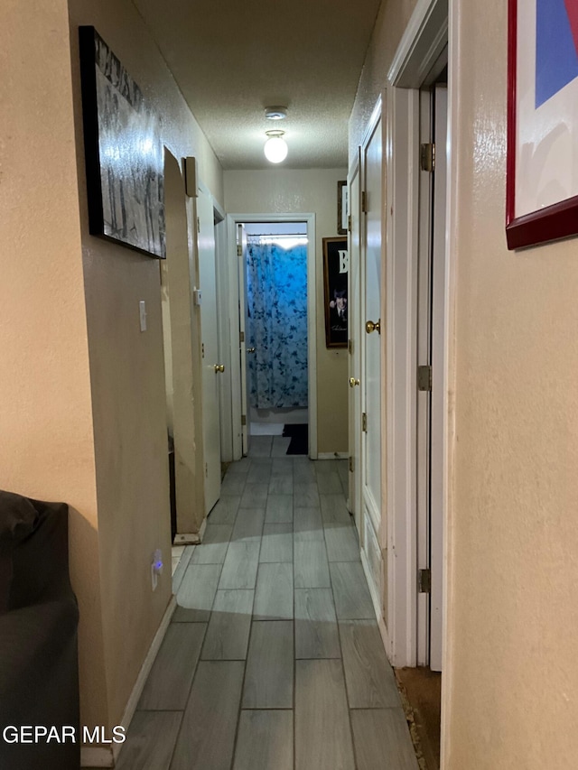 11816 Oxcart Run St, El Paso, TX 79936 - hallway with baseboards
