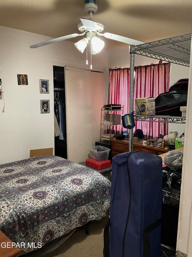 11816 Oxcart Run St, El Paso, TX 79936 - carpeted bedroom featuring a closet and ceiling fan