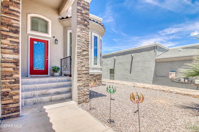 12571 New Dawn Dr, El Paso, TX 79928 - entrance to property with stucco siding and stone siding