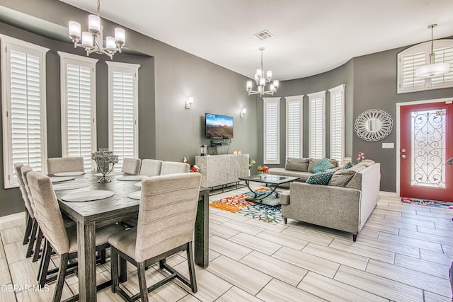 12571 New Dawn Dr, El Paso, TX 79928 - dining area featuring a chandelier