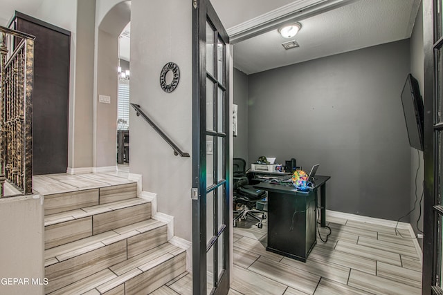 12571 New Dawn Dr, El Paso, TX 79928 - office space with arched walkways and wood tiled floors