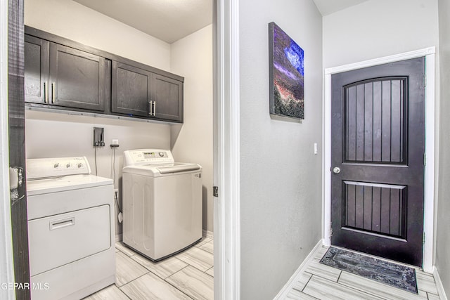 12571 New Dawn Dr, El Paso, TX 79928 - washroom featuring separate washer and dryer and cabinet space