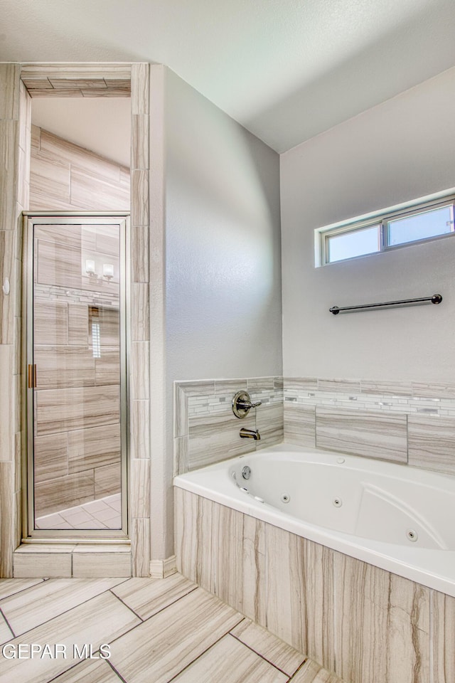 12571 New Dawn Dr, El Paso, TX 79928 - bathroom featuring a shower stall and a whirlpool tub