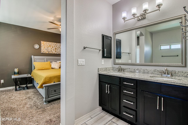 12571 New Dawn Dr, El Paso, TX 79928 - bathroom with ceiling fan and double vanity